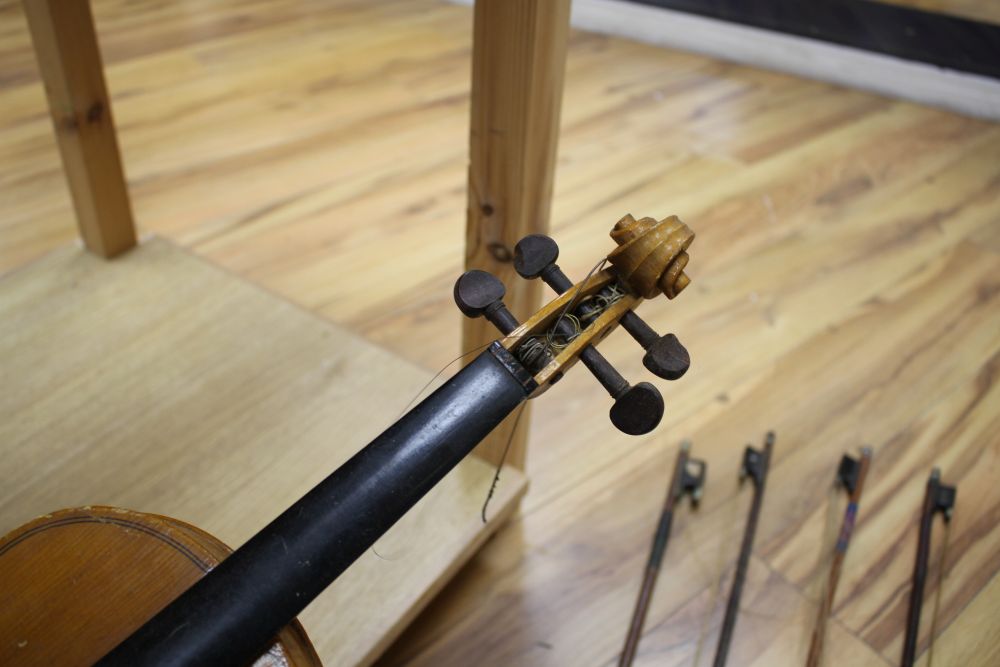 A Chinese violin and four bows